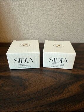 Two for one: NWT - SIDIA SOAKED Solid Perfume